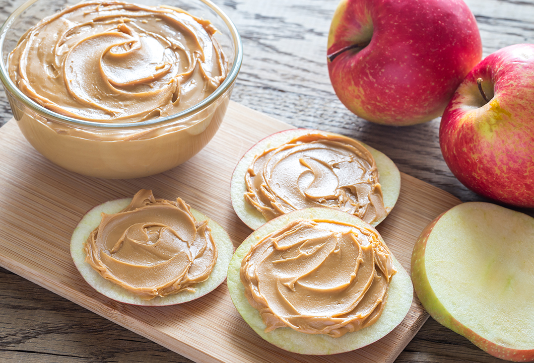 Slices of apples with peanut butter